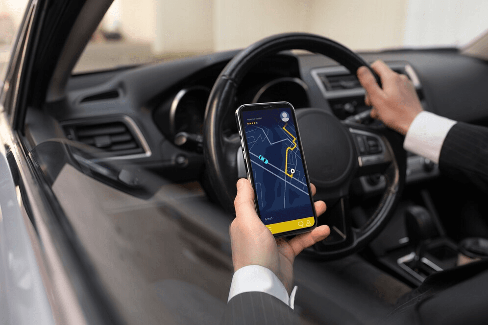 A picture showing giving me a view of the steering wheel of the car.